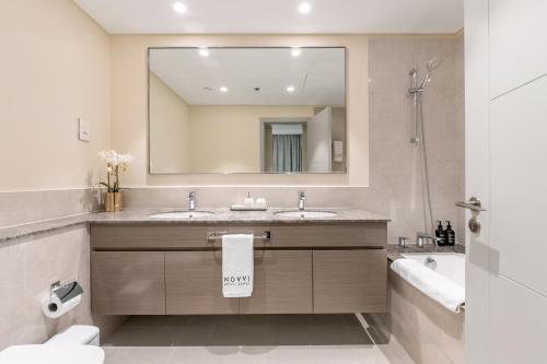 Koupelna v ubytování Stylish 2BR in Forte 2