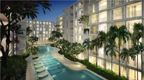 une image d'un bâtiment avec une piscine dans l'établissement The Modern central Phuket base condo by luxStays, à Ban Rangeng