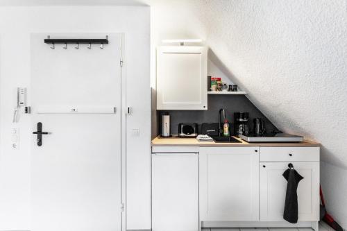 Kuchyň nebo kuchyňský kout v ubytování Louis Hafenblick