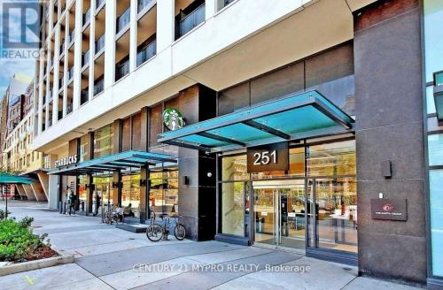 a store front of a building with glass windows at Cozy holiday home in Toronto