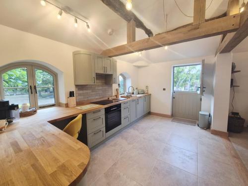 Köök või kööginurk majutusasutuses The Coach House at Greenhill