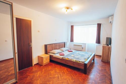 Кровать или кровати в номере Apartment in the city center