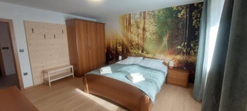 Ένα ή περισσότερα κρεβάτια σε δωμάτιο στο Apart House ROJER