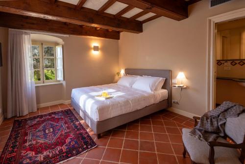 Postel nebo postele na pokoji v ubytování Agrisuite Le Querce del Vareglio