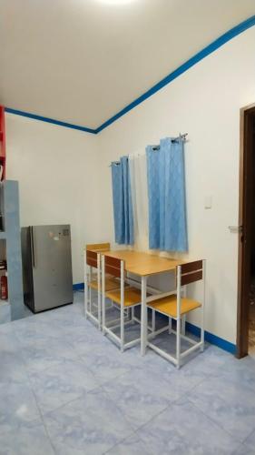 Køkken eller tekøkken på Blue House - Cozy 1BR in General Luna