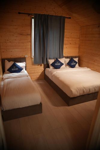 Giường trong phòng chung tại Rayan Eco Resort Sary Oi - Раян Резорт - ущелье Сары-Ой