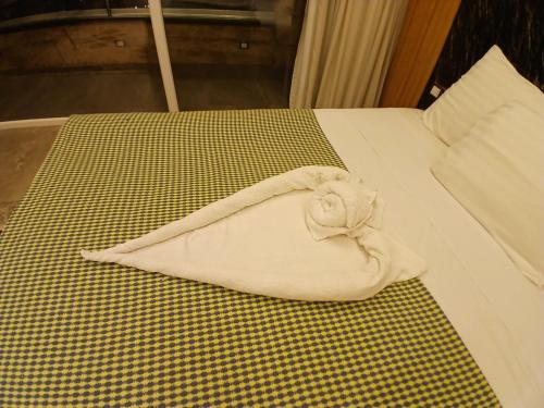 Postel nebo postele na pokoji v ubytování Pyramids View & GEM view Boutique