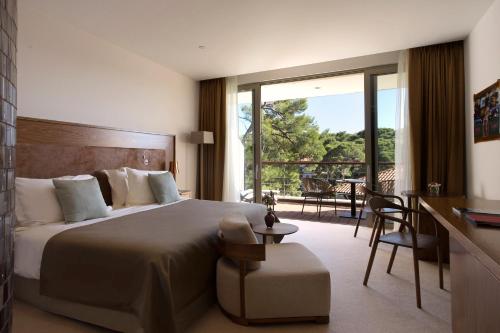 Postel nebo postele na pokoji v ubytování Boutique Hotel Alhambra