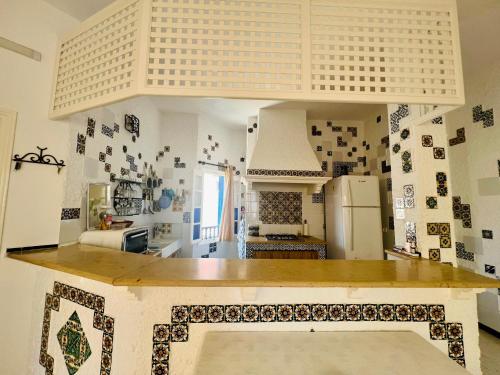 Η κουζίνα ή μικρή κουζίνα στο Apparemment 3 chambres et balcon