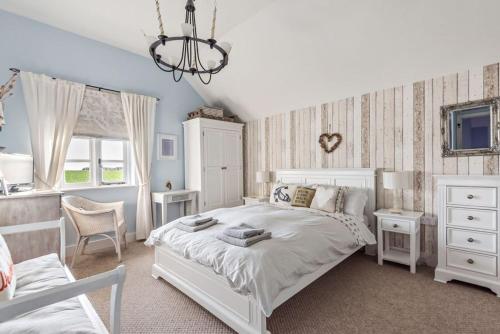 Una cama o camas en una habitación de Pinkleton