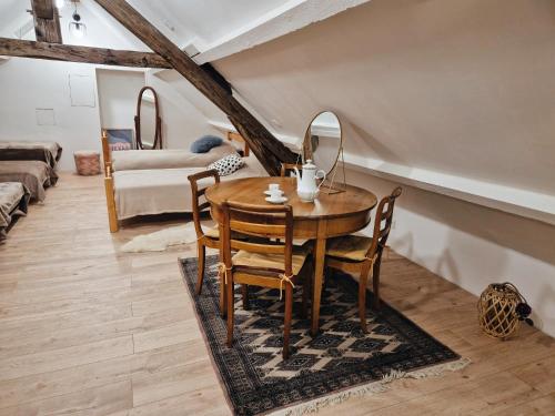 Ένα ή περισσότερα κρεβάτια σε δωμάτιο στο Dortoir 8 personnes dans Beau Gîte