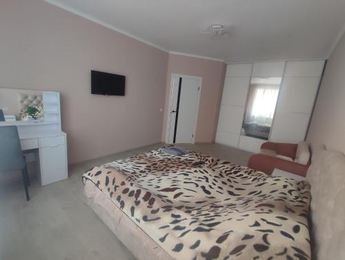 Postel nebo postele na pokoji v ubytování Квартира в центрі міста