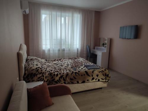 Postel nebo postele na pokoji v ubytování Квартира в центрі міста