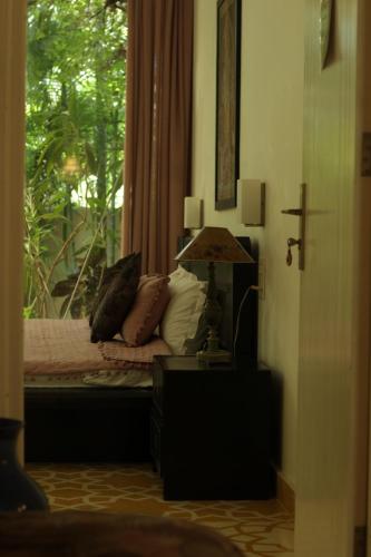 Postel nebo postele na pokoji v ubytování Siboney House by evaddo