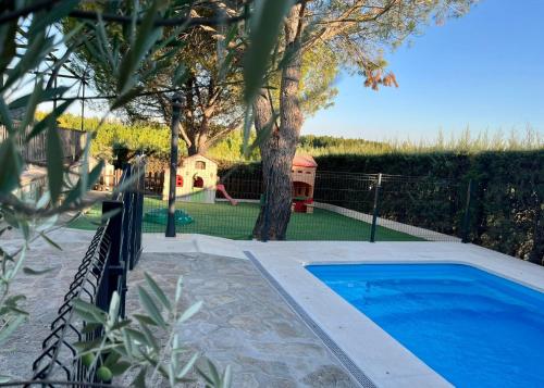 Πισίνα στο ή κοντά στο GuestReady - Los Jilgueros del Alberche