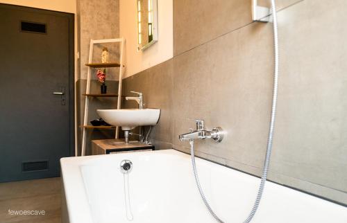 Ένα μπάνιο στο Gemütliche und komfortable Wohnung für 6 P