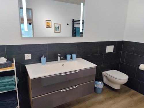 Ένα μπάνιο στο Apartment Kleine Auszeit - stylish & cozy