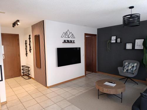 Μια τηλεόραση ή/και κέντρο ψυχαγωγίας στο Altrove Leukerbad - Modern, Spacious & Central