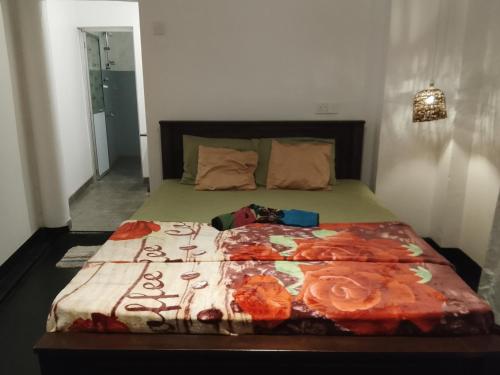 En eller flere senge i et værelse på Sihe House