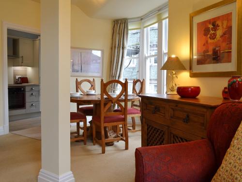 a kitchen and dining room with a table and chairs at Causey Pike in Keswick