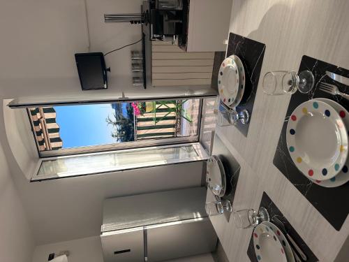 Η κουζίνα ή μικρή κουζίνα στο Mela Garden House