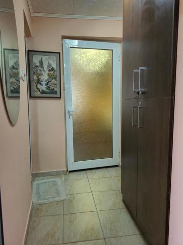 a door to a hallway with a door to a room at Guest House Valchanovi in Elkhovo