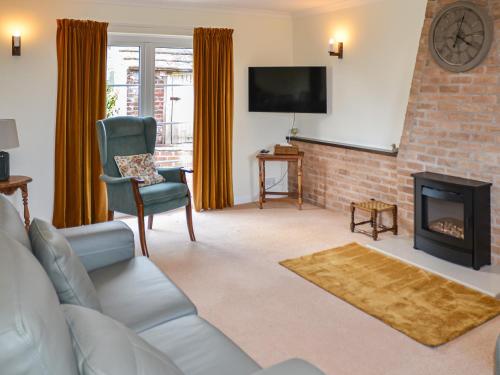 TV a/nebo společenská místnost v ubytování Rivendell