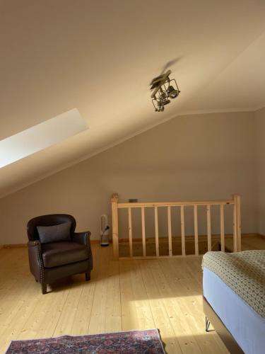 a bedroom with a bed and a bird on the ceiling at 2 Floor Rustic Inn in Dilijan in Dilijan