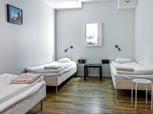 Cama ou camas em um quarto em Mosebacke Hostel