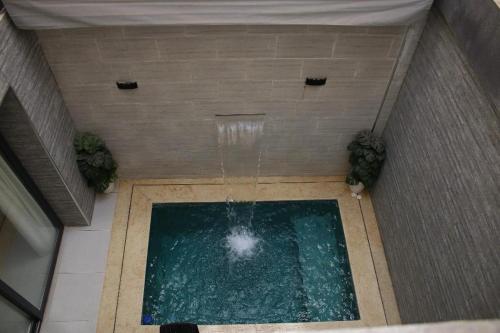 Bazén v ubytování Nouvel appartement moderne nebo v jeho okolí