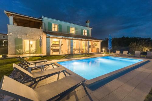 Villa Stella Polaris for 8 persons in Central Istria with private pool, sea view, large garden & kids playground