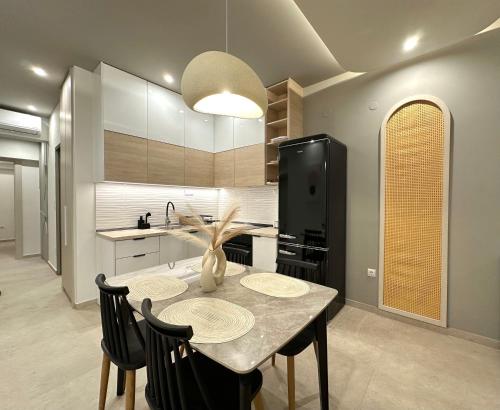 Η κουζίνα ή μικρή κουζίνα στο NOÈA Luxury Suites