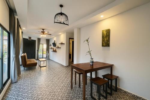 Posezení v ubytování Canopy Pool Villa