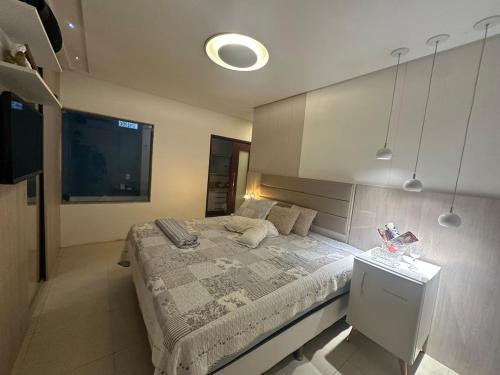 Ένα ή περισσότερα κρεβάτια σε δωμάτιο στο Casa em gravata com 4 quartos