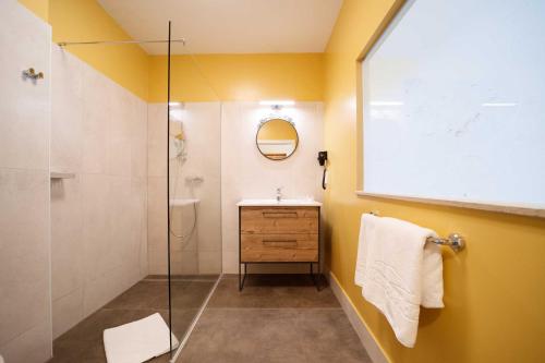 Un baño de VULKAN Residenz Hotel I Self Check-in