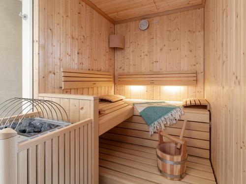 a sauna with a soaking tub in it at Stöffler Haus Top 2 in Tamsweg
