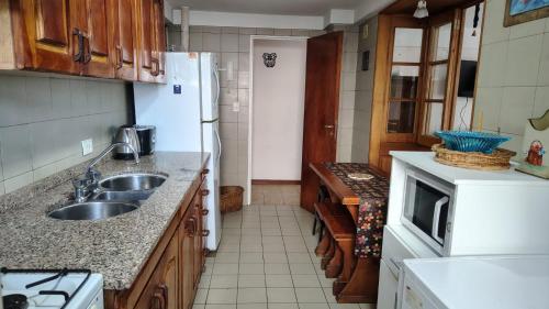 Køkken eller tekøkken på Centro con Vista al lago