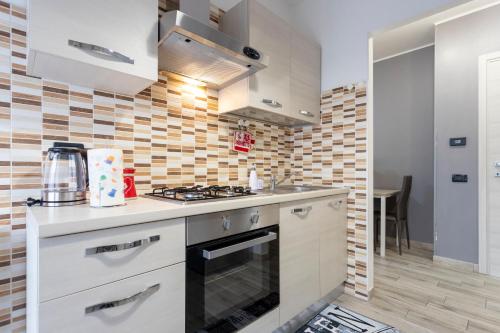 Η κουζίνα ή μικρή κουζίνα στο Garden View Novara - Near Hospital - Free Wifi