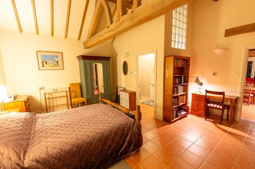 Postel nebo postele na pokoji v ubytování Nature's Lodge