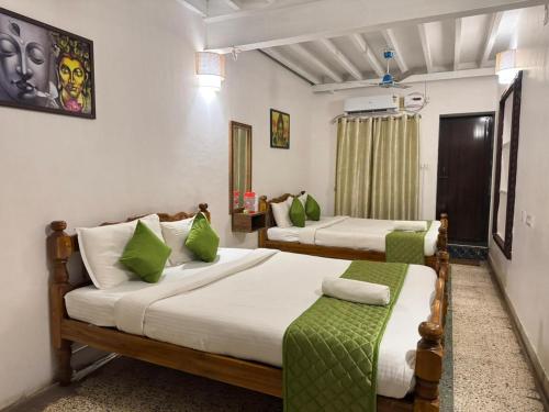 Voodi või voodid majutusasutuse La Villa Heritage - TIE toas