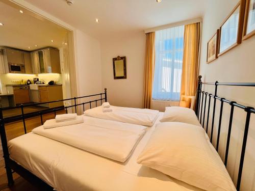 En eller flere senge i et værelse på Appartement Schmale Heide