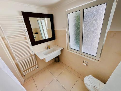 Et badeværelse på Appartement Schmale Heide