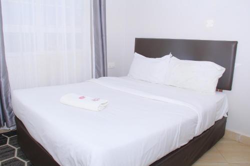 Postel nebo postele na pokoji v ubytování J hope homes Naivasha