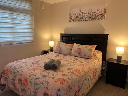 Postel nebo postele na pokoji v ubytování Acogedor Apartamento Valdiviano