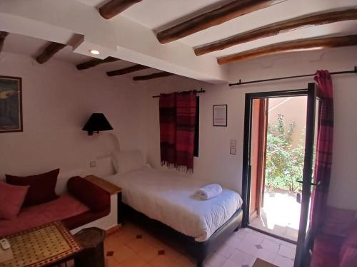 Ένα ή περισσότερα κρεβάτια σε δωμάτιο στο La casa de alma