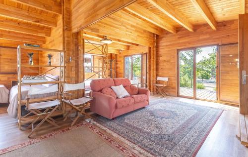 a living room with a couch and a table at Beautiful Home In Guardamar Del Segura in El Camino de Catral