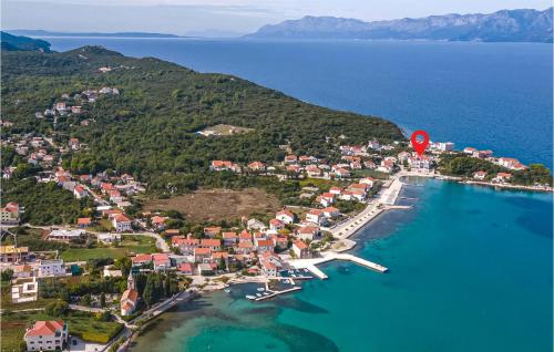 an aerial view of a small island in the water at Cozy Apartment In Sreser With Wifi in Sreser