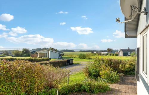a view of a field from a house at Amazing Home In Snedsted With Wifi in Skyum