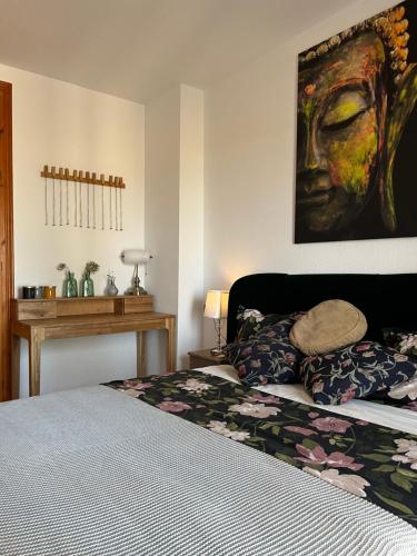 En eller flere senge i et værelse på Ferienhaus Costa Almeria