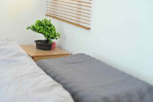 Ένα ή περισσότερα κρεβάτια σε δωμάτιο στο บ้านเคียงดาวแม่สะเรียง